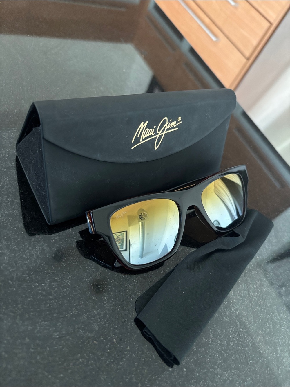 Maui Jim Black Frame Sunglasses with Gold Mirror Lenses